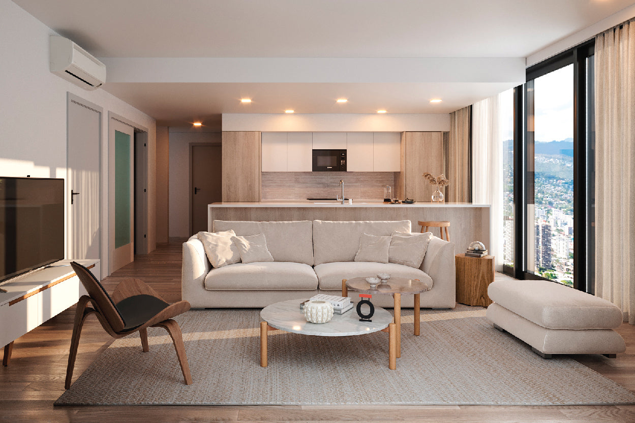 Fully furnished coastal living room apartment interior design with low coffee table, wooden barstool, and wooden accent chair.