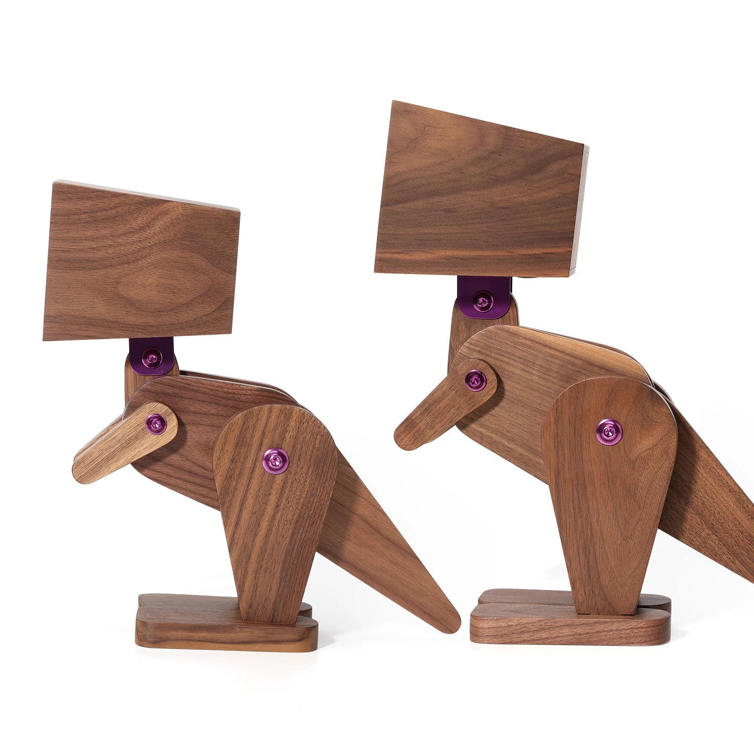 Wooden bird bookends on a white background