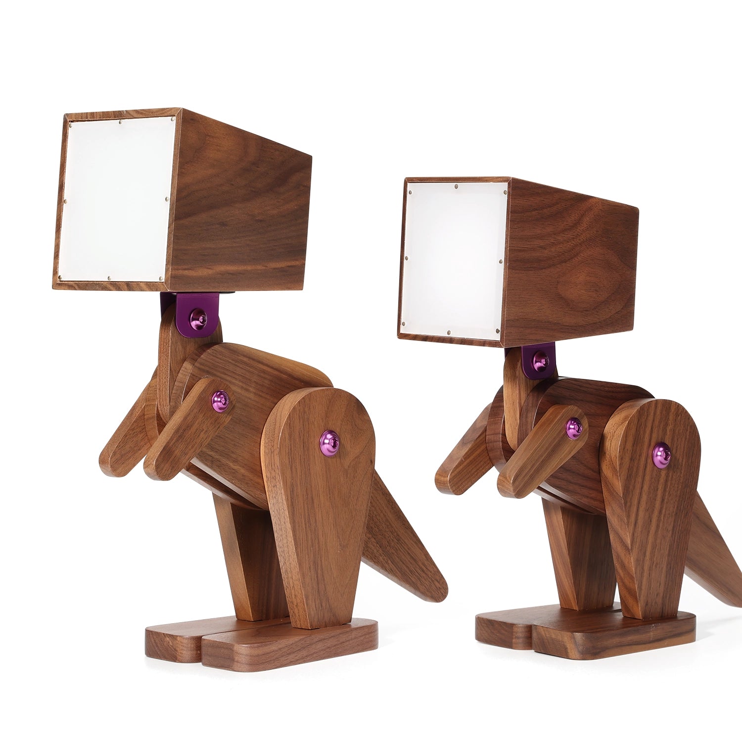 Two wooden dog-shaped lamps with square lampshades on a white background