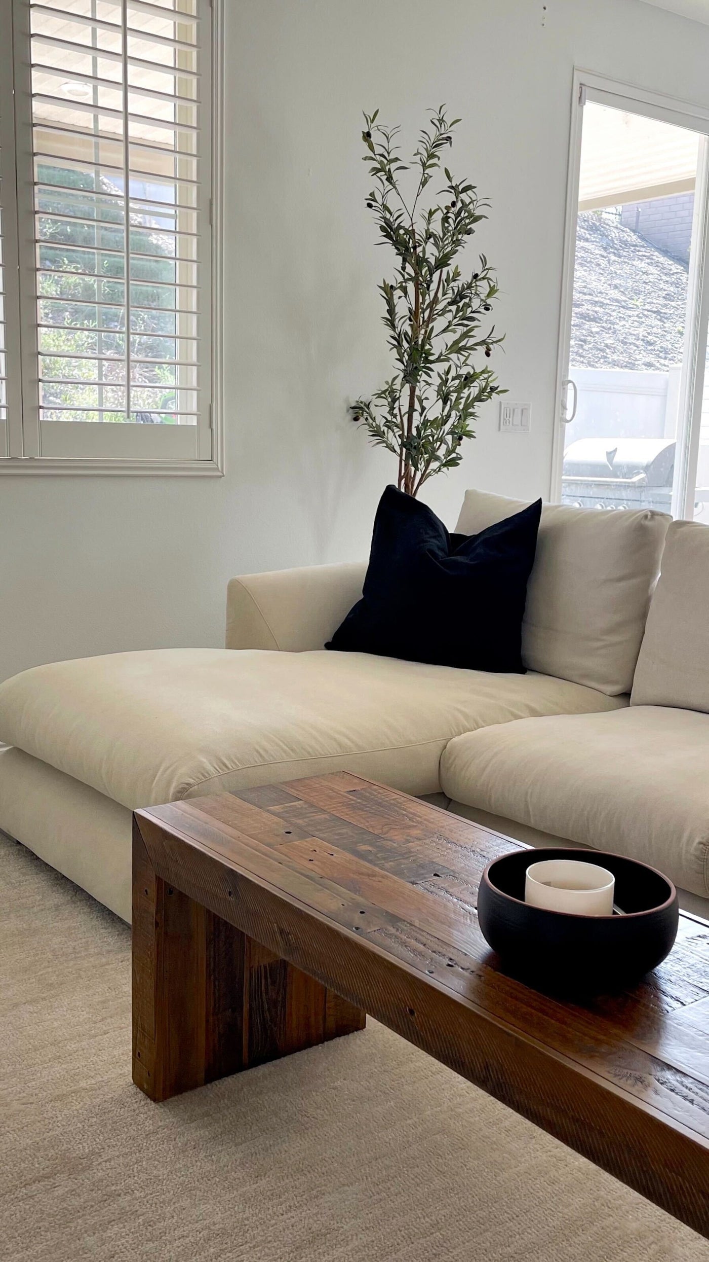 A cream Valyou sectional in a calm, lived-in customer home