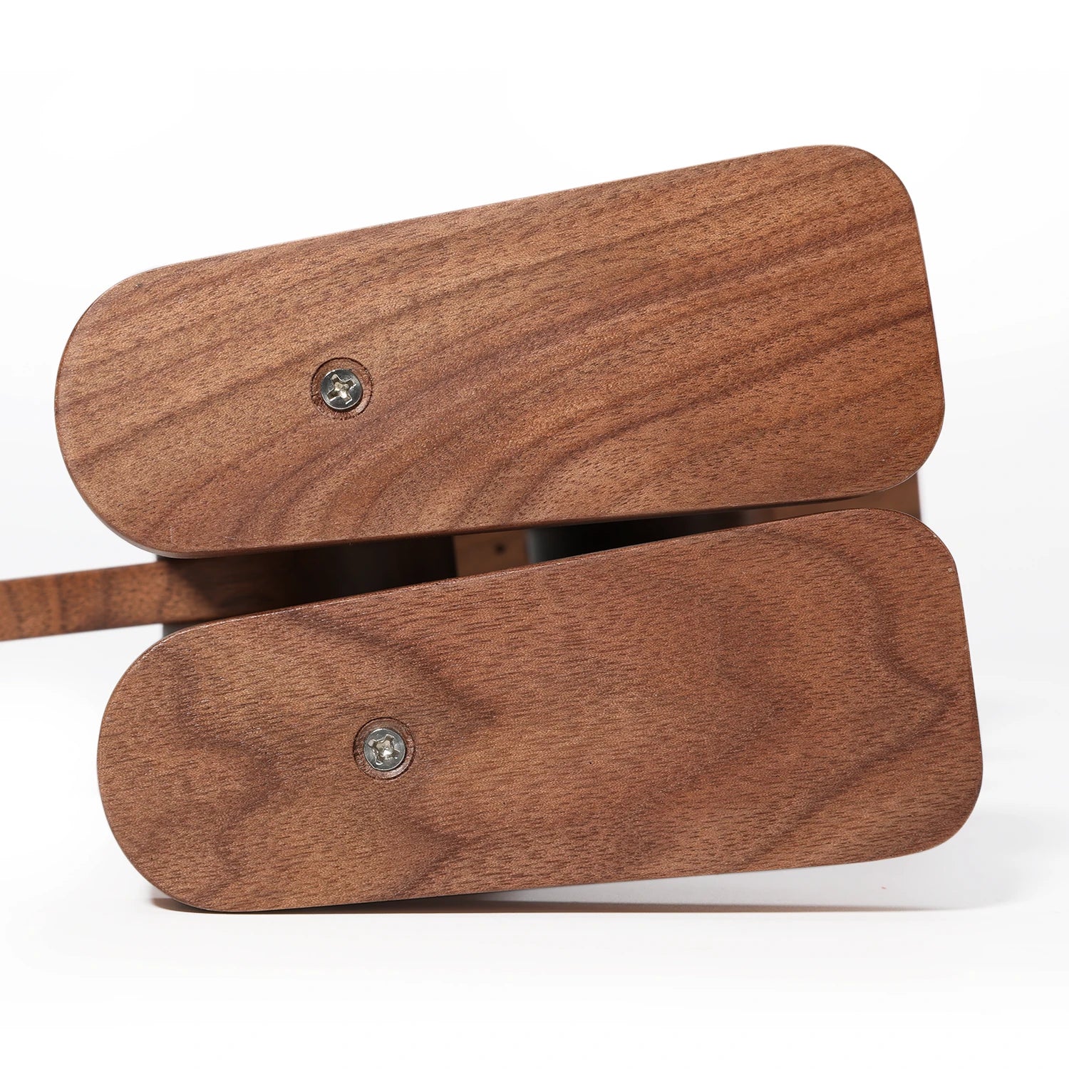 Wooden belt buckle on a white background