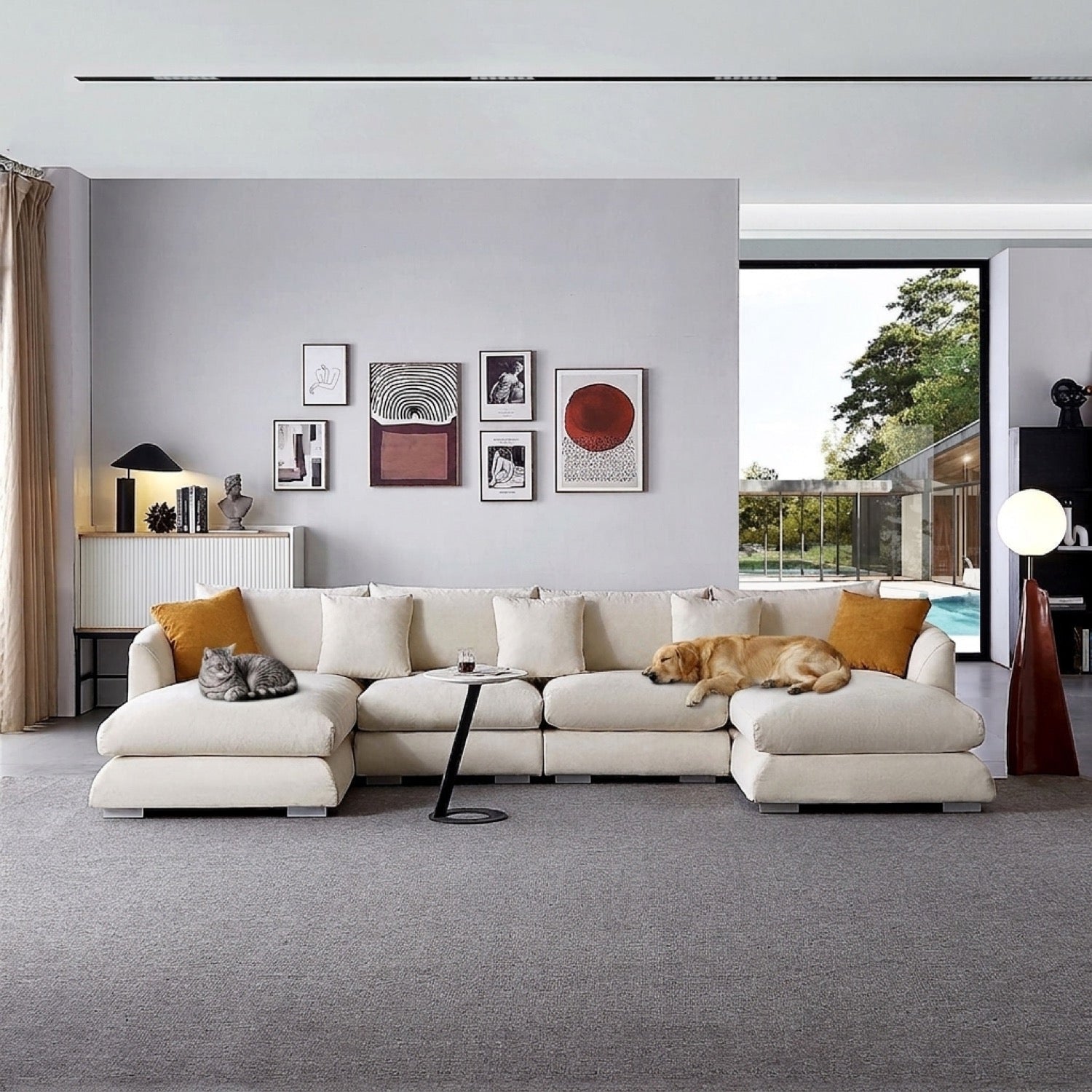 Beige U-sectional sofa in a modern living room with pets and artwork