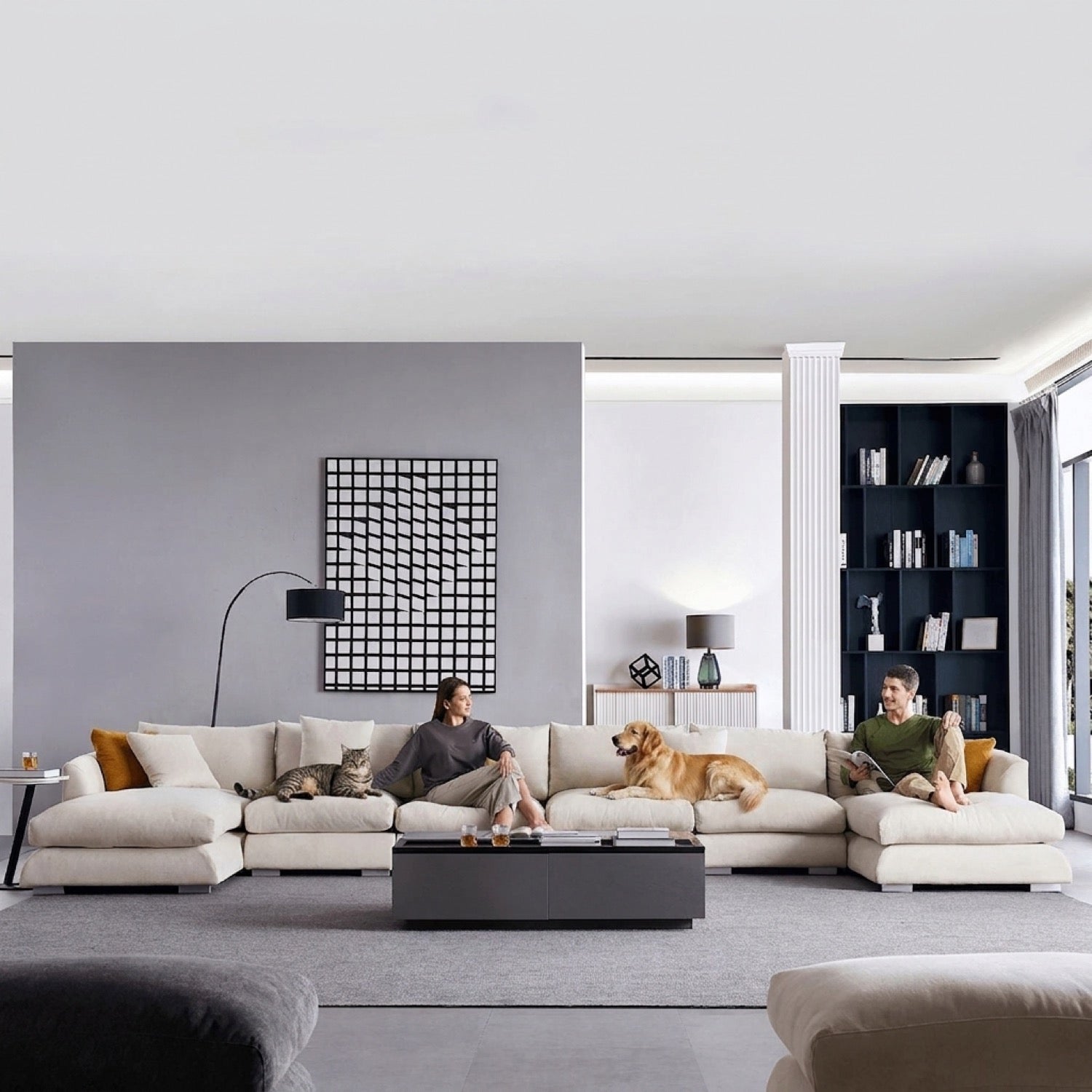 Beige U-sectional sofa in a modern living room with people and pets